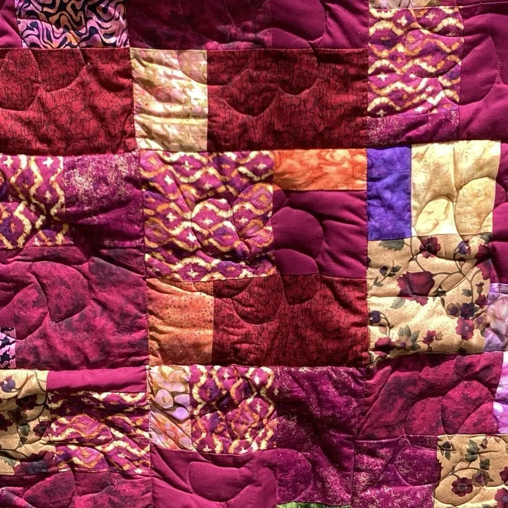 NWT. Hand Crafted Maroon/Wine Mixed Prints Lap Quilt